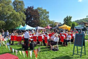 The Avon Fire & Rescue Brass Band playing in the arena